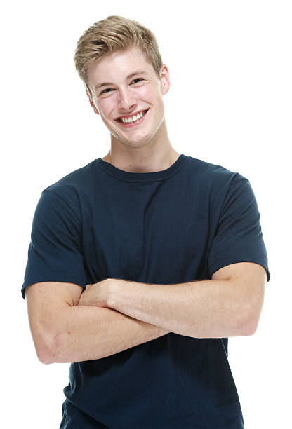 istock Smiling man standing with arms crossed 496599665