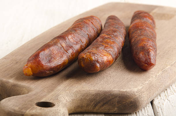 istock spanish chorizo on wooden board 496601077