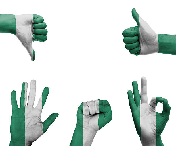 A set of hands with different gestures wrapped in the flag of Nigeria