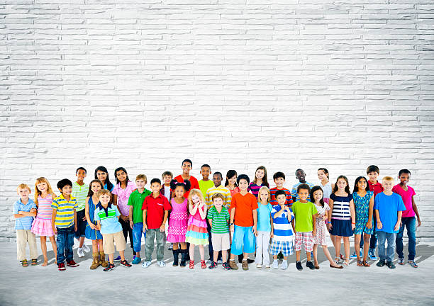 Group of Multiethnic Happy Children Group of multiethnic happy children mixed age range stock pictures, royalty-free photos & images