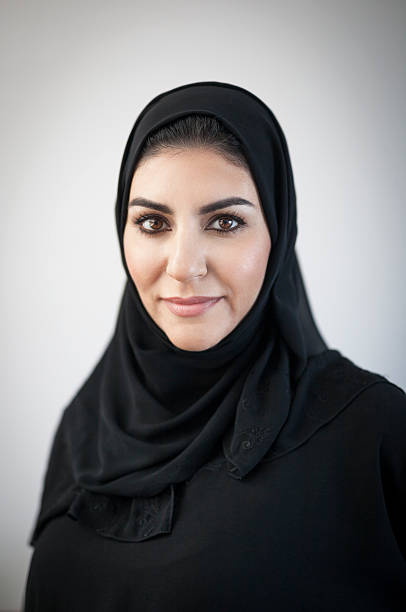istock Religious Arab Woman with Light Vignetted Background 496603140