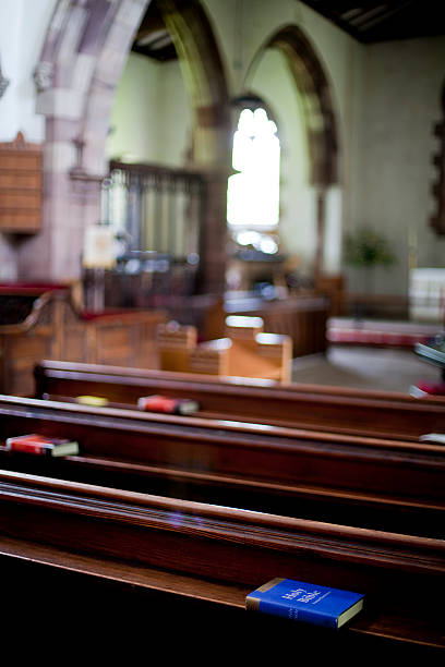 istock Bible on Pew in Church 496603573
