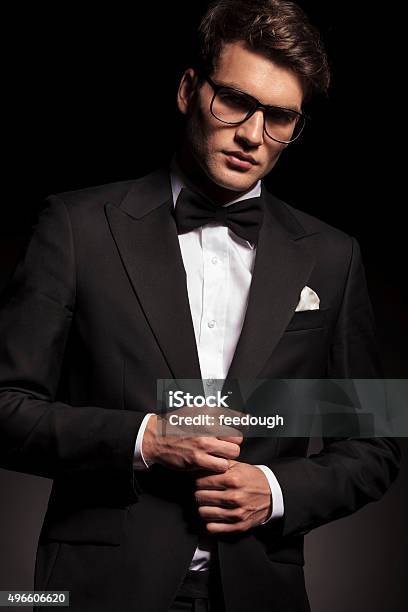 Handsome Elegant Man Closing His Jacket Stock Photo - Download Image Now - 2015, Adult, Adults Only