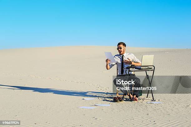 Businessman Using Laptop In A Desert Stock Photo - Download Image Now - Desert Area, Working, Loneliness