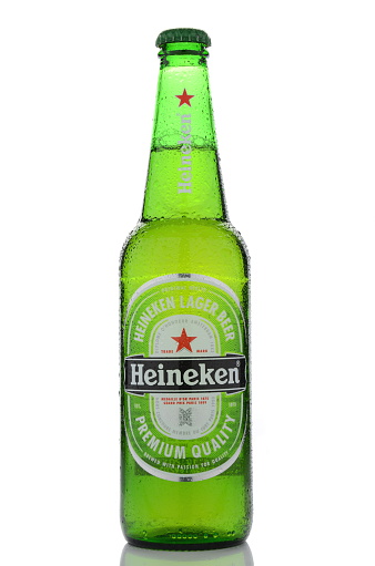 Kwidzyn, Poland - May 19, 2015: Heineken lager beer isolated on white background. Heineken has been produced by Dutch brewing company Heineken International since 1873