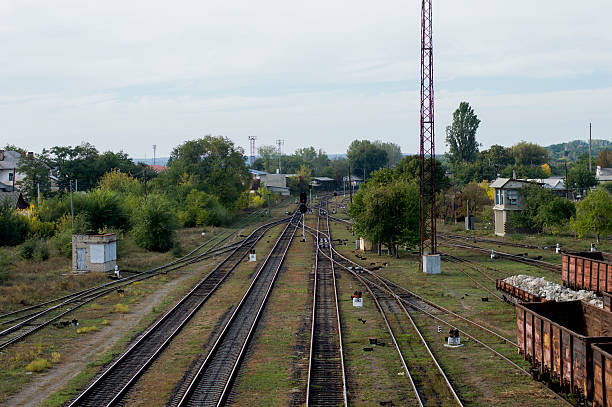 istock red light signal on a railway fork, railway tracks 496615108