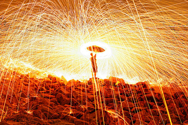 Burning steel wool fireworks stock photo