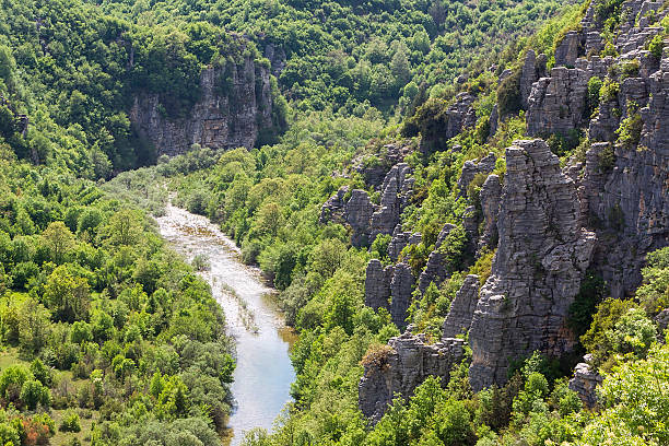 istock Mountain landscape with rock formations and a river 496616889