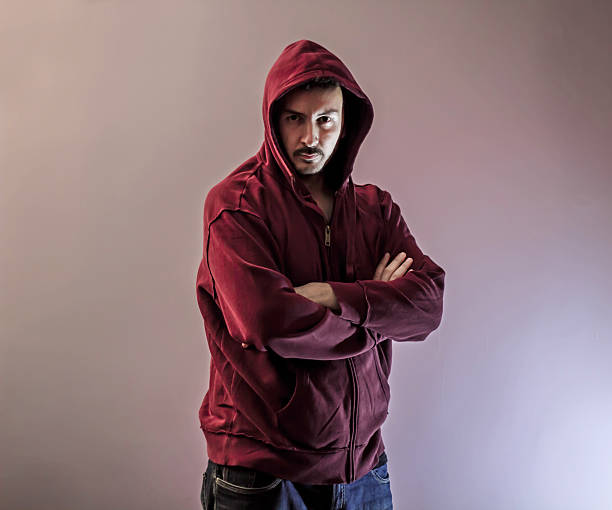 istock Man In Hood Arms Crossed 496618087