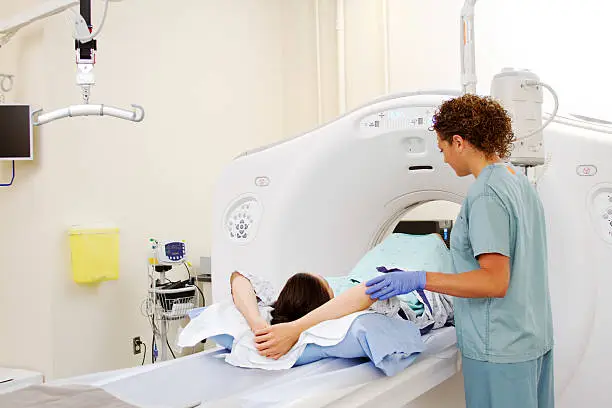 Photo of Lady having CAT scan