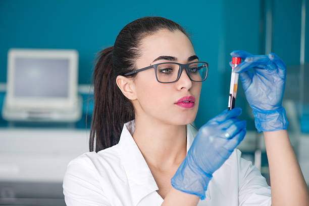 istock doctor diagnosing a blood test 496621477