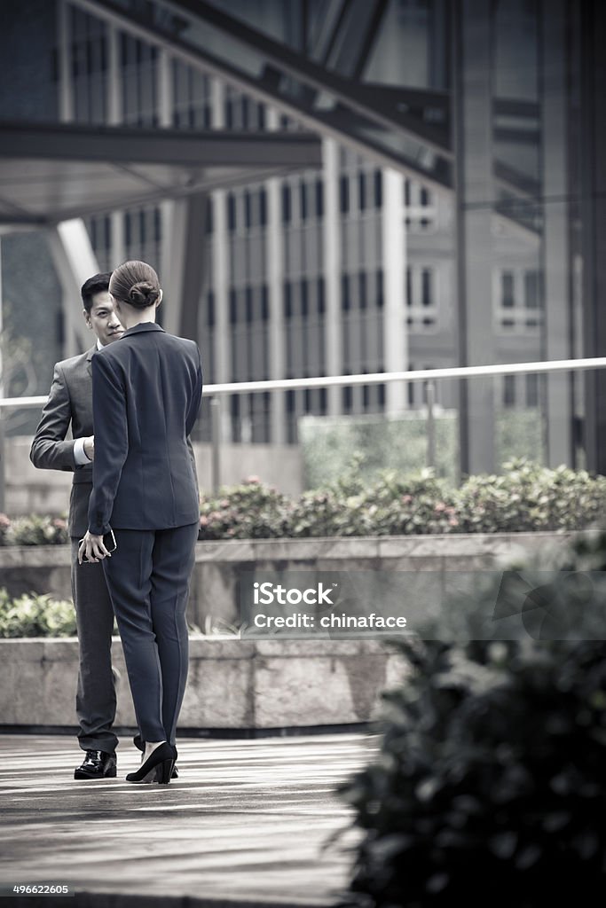 business people handshake young professional business people handshake   at the International Financial Center of hong kong china, Asia Stock Photo