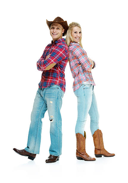 istock Happy young couple standing with arms crossed 496622669