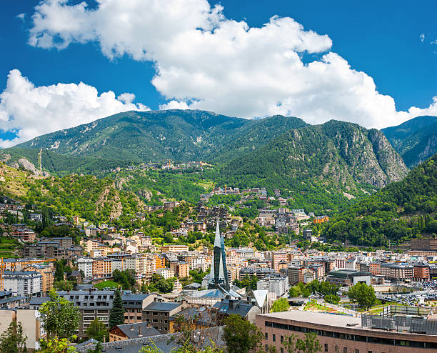 andorra la vella bajo puffy nubes - architecture bright vibrant color brilliant fotografías e imágenes de stock