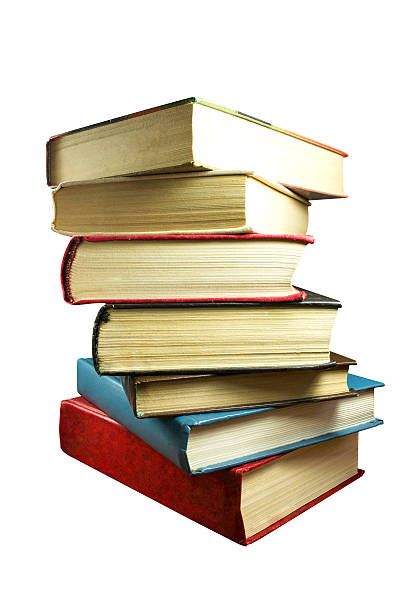 istock Old colorful books isolated on white background 496623137
