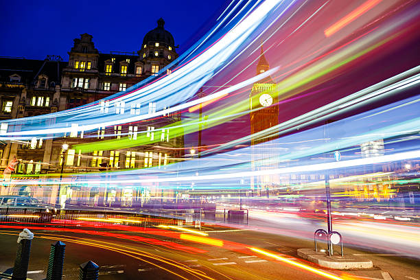 istock Light trails in front of Big Ben, Westminster, London, UK 496623541