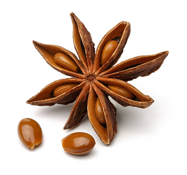 Star Anise Star anise on a white background star anise stock pictures, royalty-free photos & images