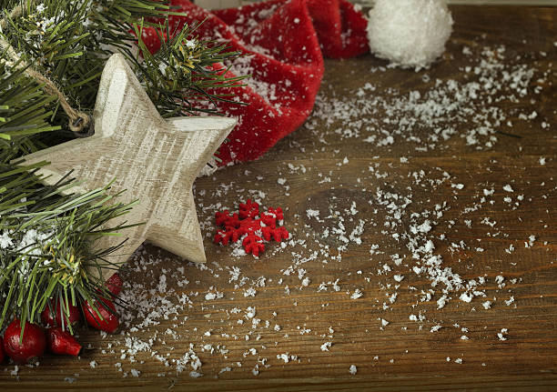 istock Christmas fir tree with  red hat 496628496