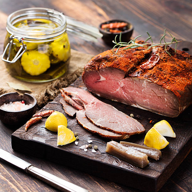 Beef pastrami sliced, roast beef  with marinated Turkish cuisine Beef pastrami sliced, roast beef , slow cooking with marinated in olive oils eggplants and scallops on wooden board,Turkish cuisine pastrami stock pictures, royalty-free photos & images