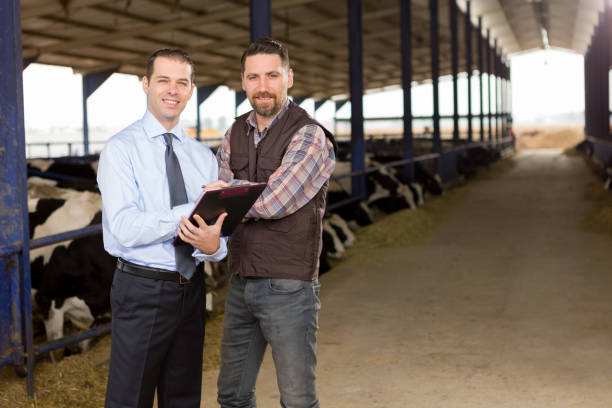 istock Farmer and Businessman 496630392