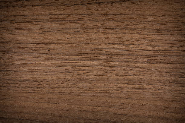 Wood Texture - Full Frame A walnut wood texture background walnut wood photos stock pictures, royalty-free photos & images