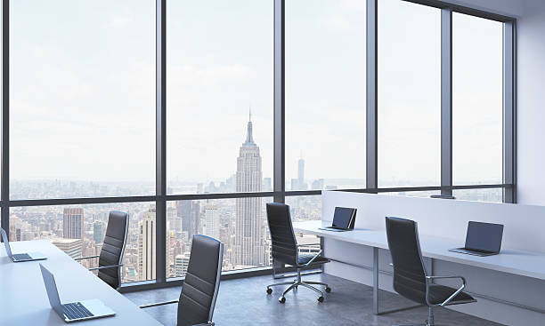 istock Workplaces in a bright modern open space office. 496634106