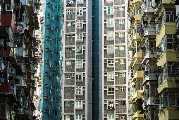 istock Crowded old and new apartments in Hong Kong 496636534