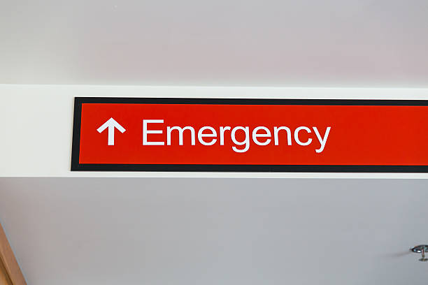 istock Emergency Room Sign with Arrow and Red 496637730