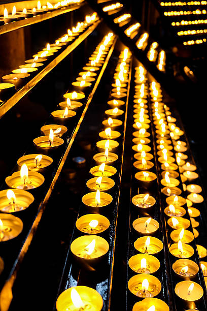istock Rows of candles in church 496638346