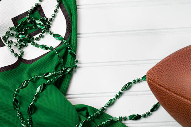 istock Sports:  Green football jersey on white background. 496640692