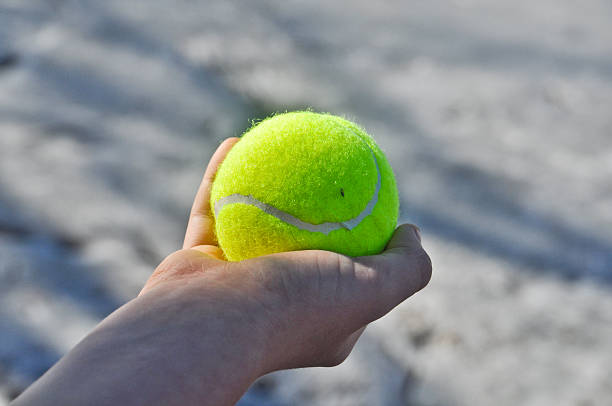 istock Tennis ball in his hand. 496646439