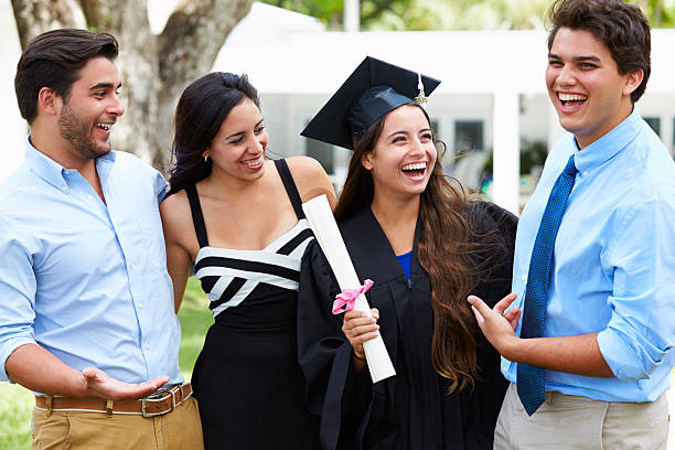 istock Hispanic Student And Family Celebrating Graduation 496646873