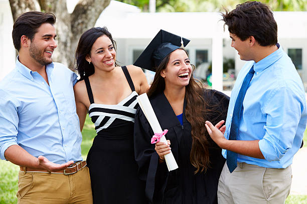 istock Hispanic Student And Family Celebrating Graduation 496646909
