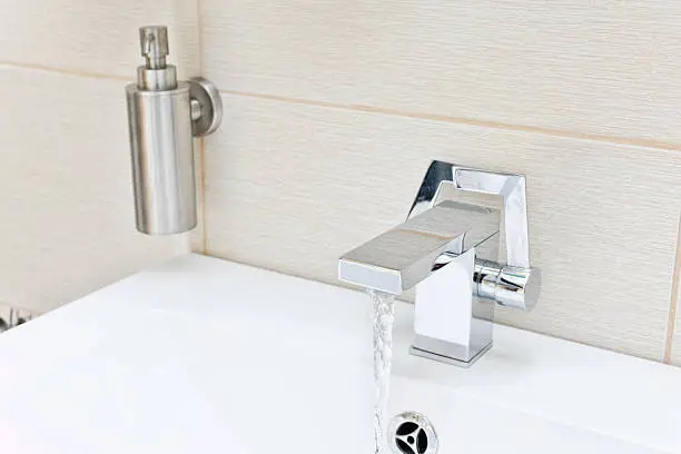 Chromium-plate tap with waterChromium-plate tap with water