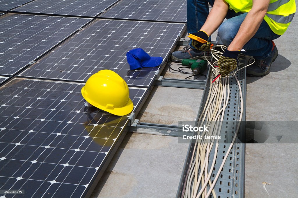 photovoltaic skilled worker Blue-collar Worker Stock Photo