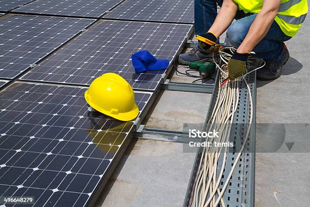 Photovoltaic Skilled Worker Stock Photo - Download Image Now - Blue-collar Worker, Business Finance and Industry, Carpenter