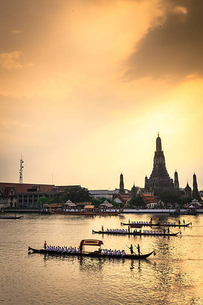 istock Royal Barge Procession in sunset ,Thailand 496649491