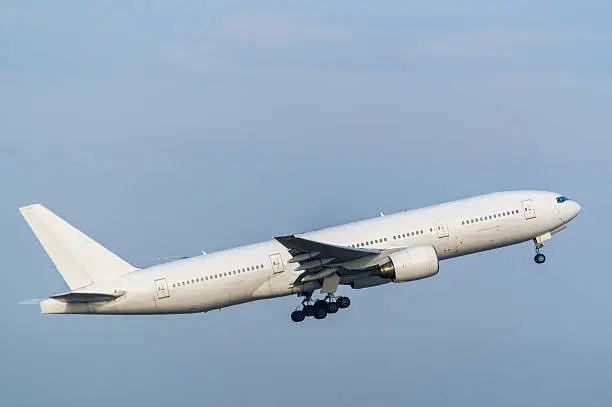 Boeing 777-200 taking off from Haneda International Airport in Tokyo, Japan.
