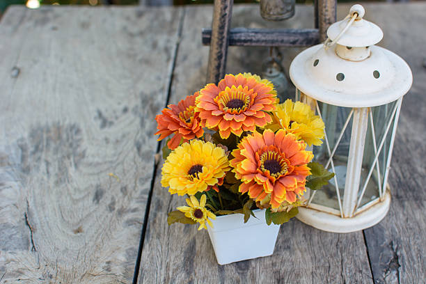 istock flower on wooden table vintage style 496649883