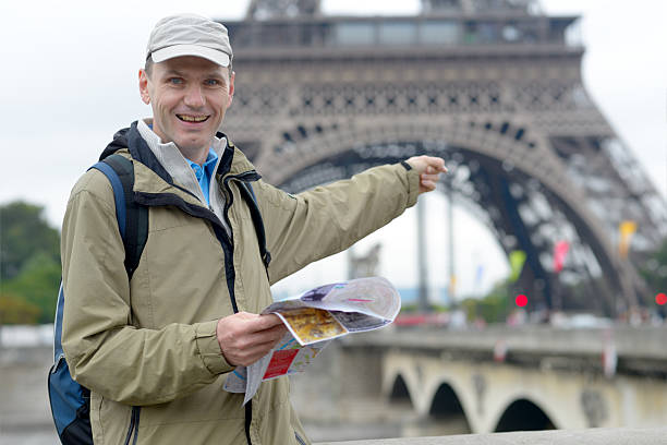 istock Tourist with a map in Paris 496650499