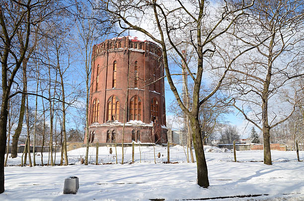 istock Old water tower in winter Gliwice, Poland 496652162
