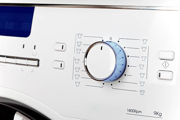 istock washing machine -  close up of  display and  choice  programs 496653588