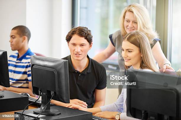 Computer Class Critique Stock Photo - Download Image Now - 2015, 40-49 Years, Adolescence