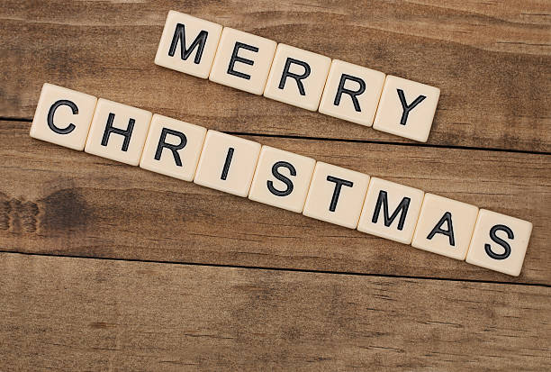 istock Merry Christmas spelled out in tan tile letters 496654830