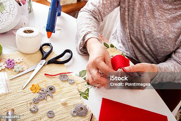 Senior Women Sews By Hand Stock Photo - Download Image Now - Craft, Senior Adult, Sewing