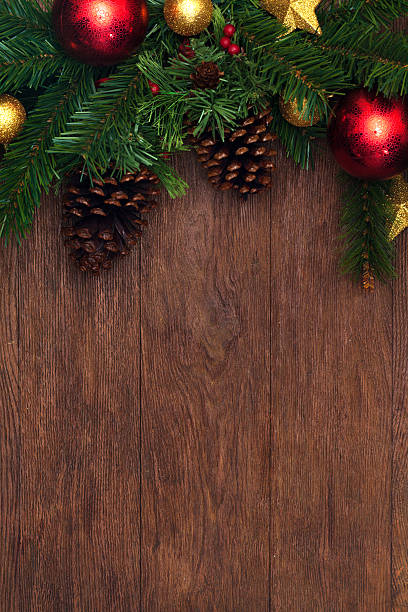 istock Christmas decoration on dark brown wooden board 496657806
