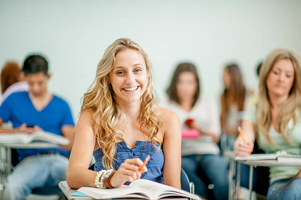 istock Woman Working on an Assignment in College 496662592