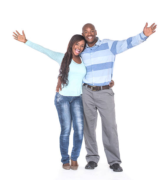 casal afro-americano animado com os braços para cima - women joy arms outstretched isolated - fotografias e filmes do acervo