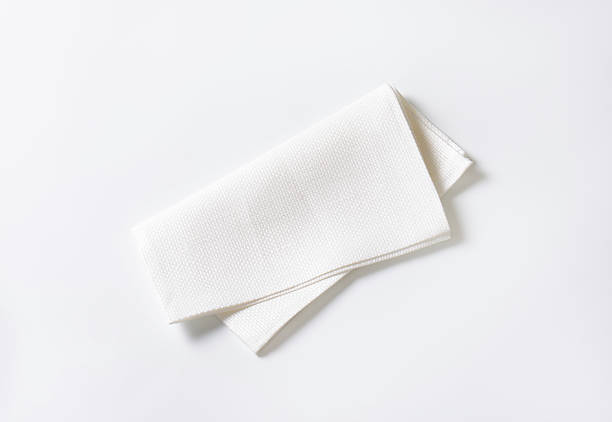 White fabric napkin Single clean white fabric napkin napkin stock pictures, royalty-free photos & images
