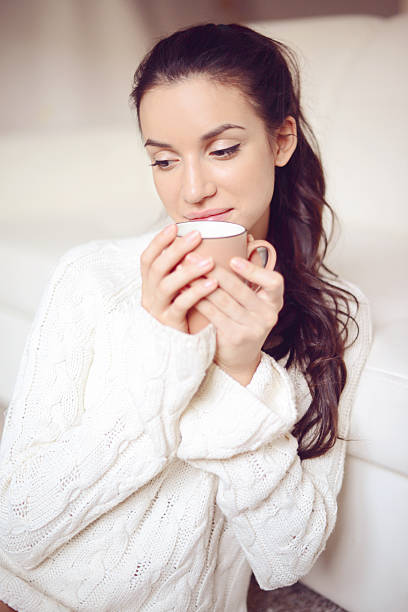 istock young woman in Home Interior 496664160